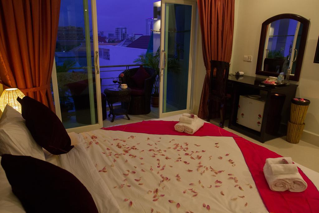 Richly Boutique Hotel Phnom Penh Habitación foto